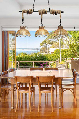 Rope pendant light over dining table