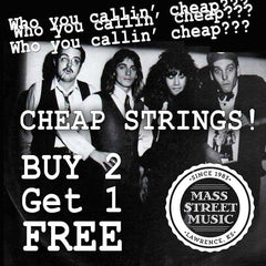 Cheap guitar strings at Mass Street Music