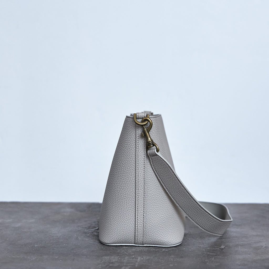 light gray purse