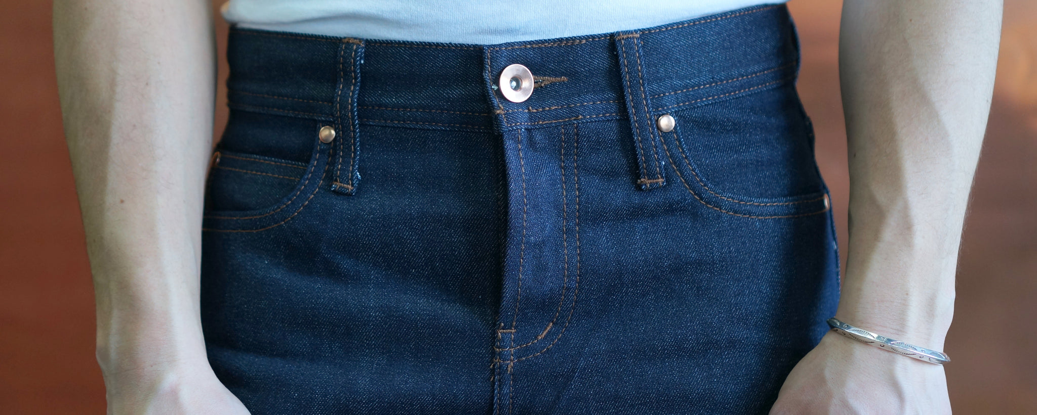 unwashed denim jeans