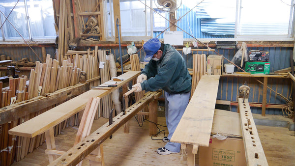 A craftsman at Horinouchi's workshop