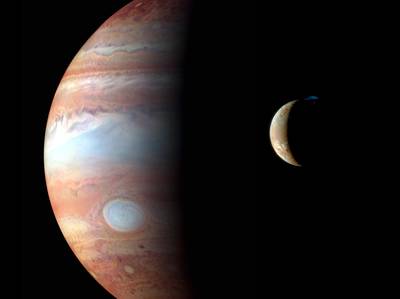 Jupiter and it's moon Io from New Horizons - Image Credit NASA