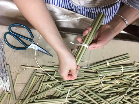 inspecting and packing bamboo straws