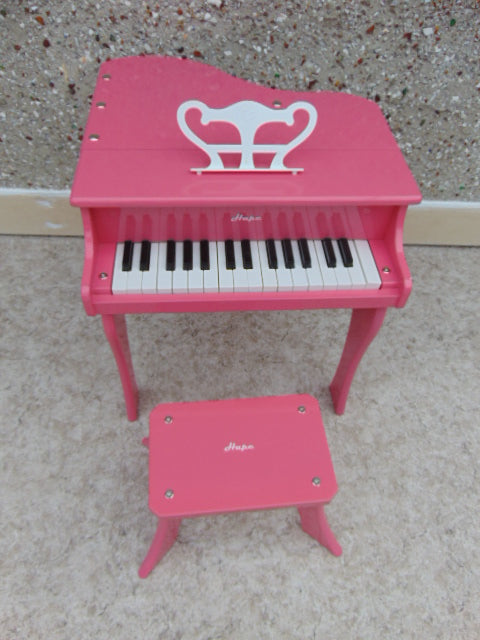 happy grand piano pink