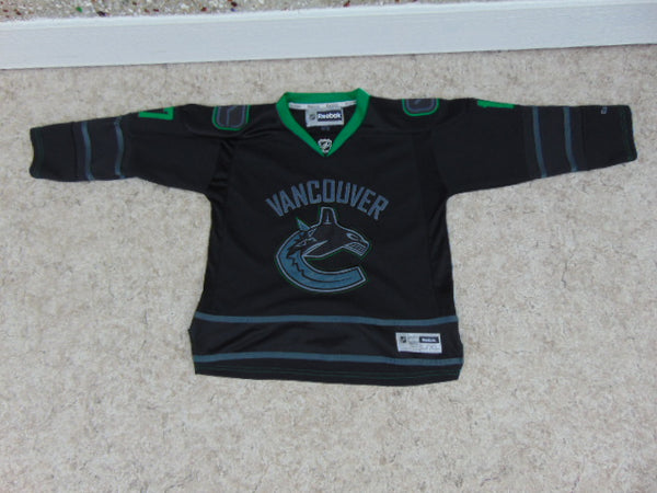 black and green canucks jersey