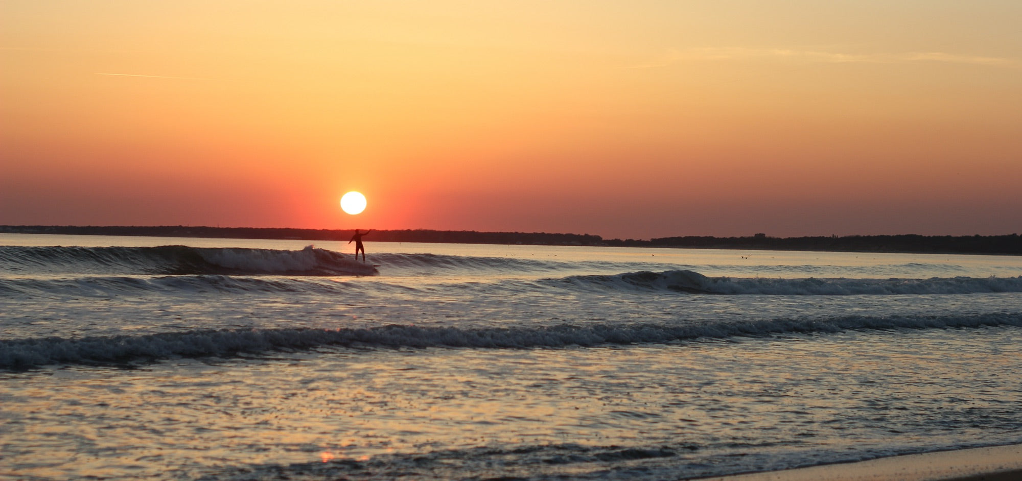 France c.2015 After 12 hours of driving, this is what the first sight of the coast delivered. Perfect logging waves no one out and an epic sunset.