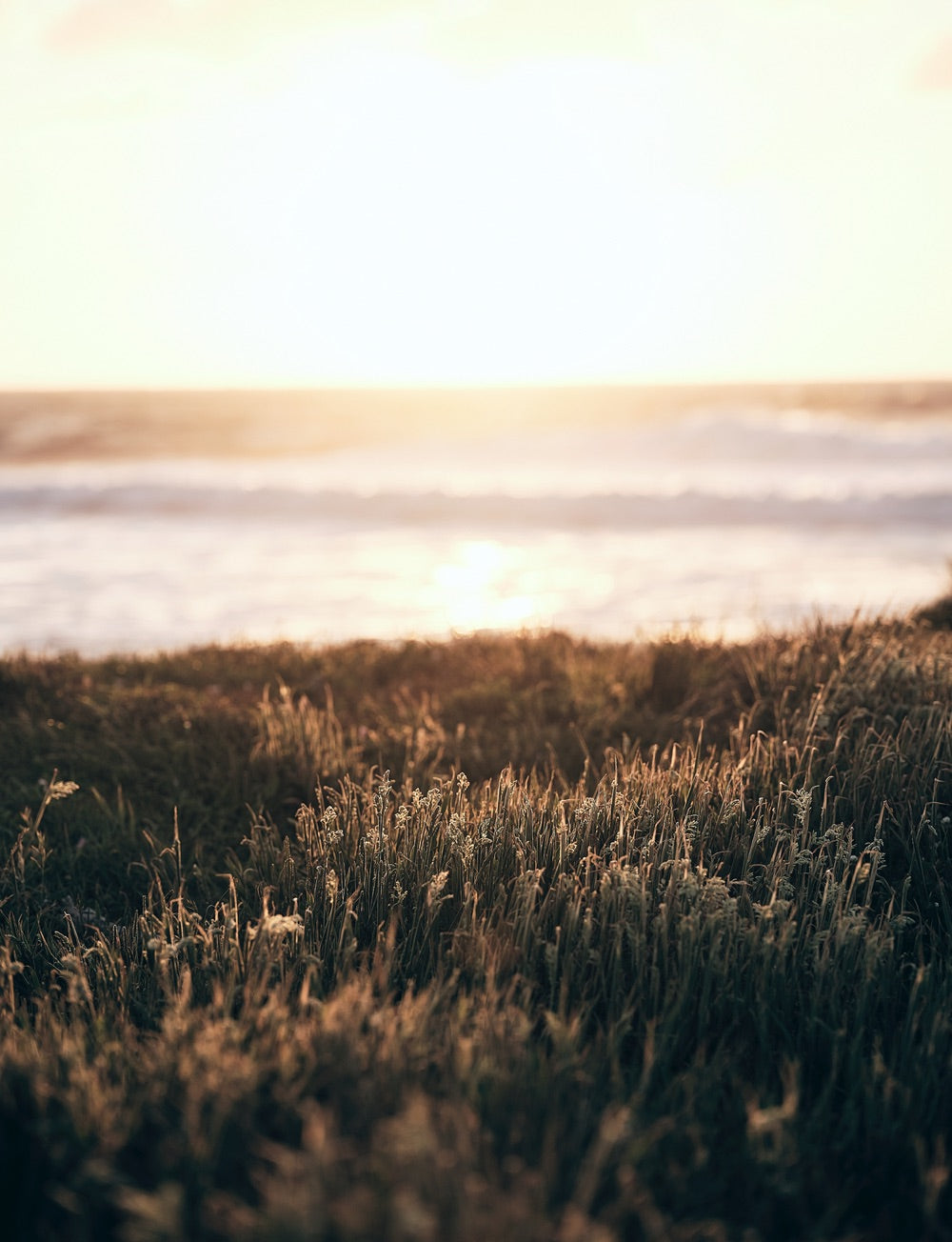 Sense of adventure: A view of the ocean as sunset begins from a cliff top