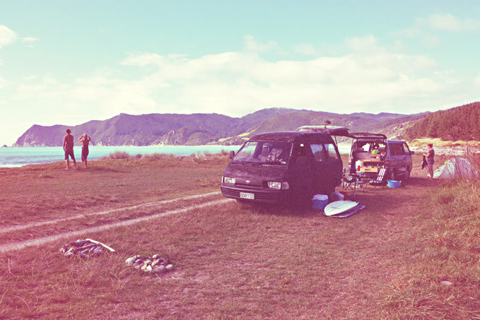 Adam setting up camp and checking out the surf