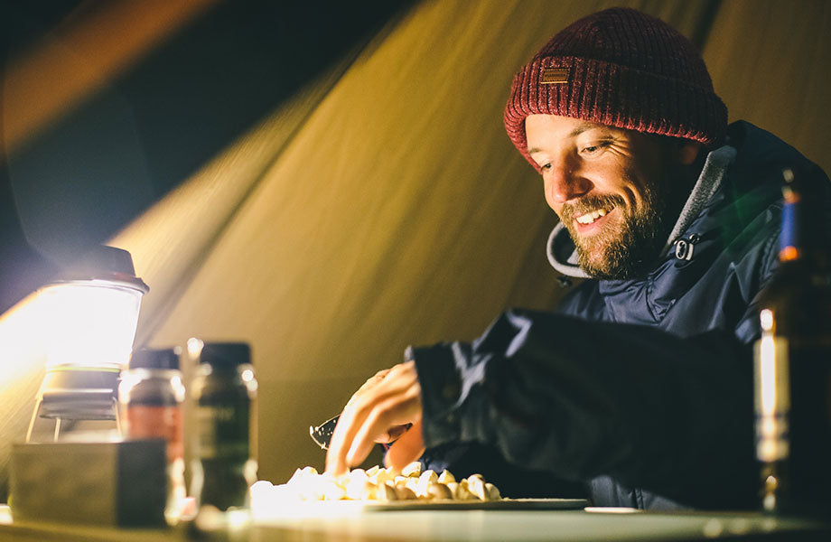Barry Mottershead cooking in the tipi