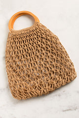 https://www.shoppriceless.com/products/beachcomber-netted-handbag