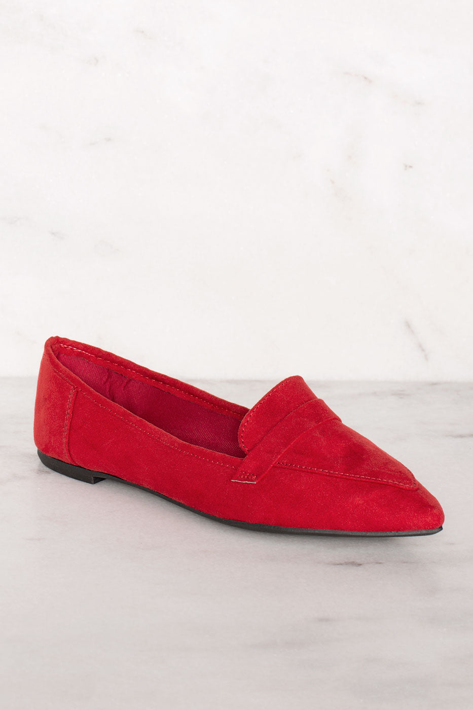 red pointed loafers