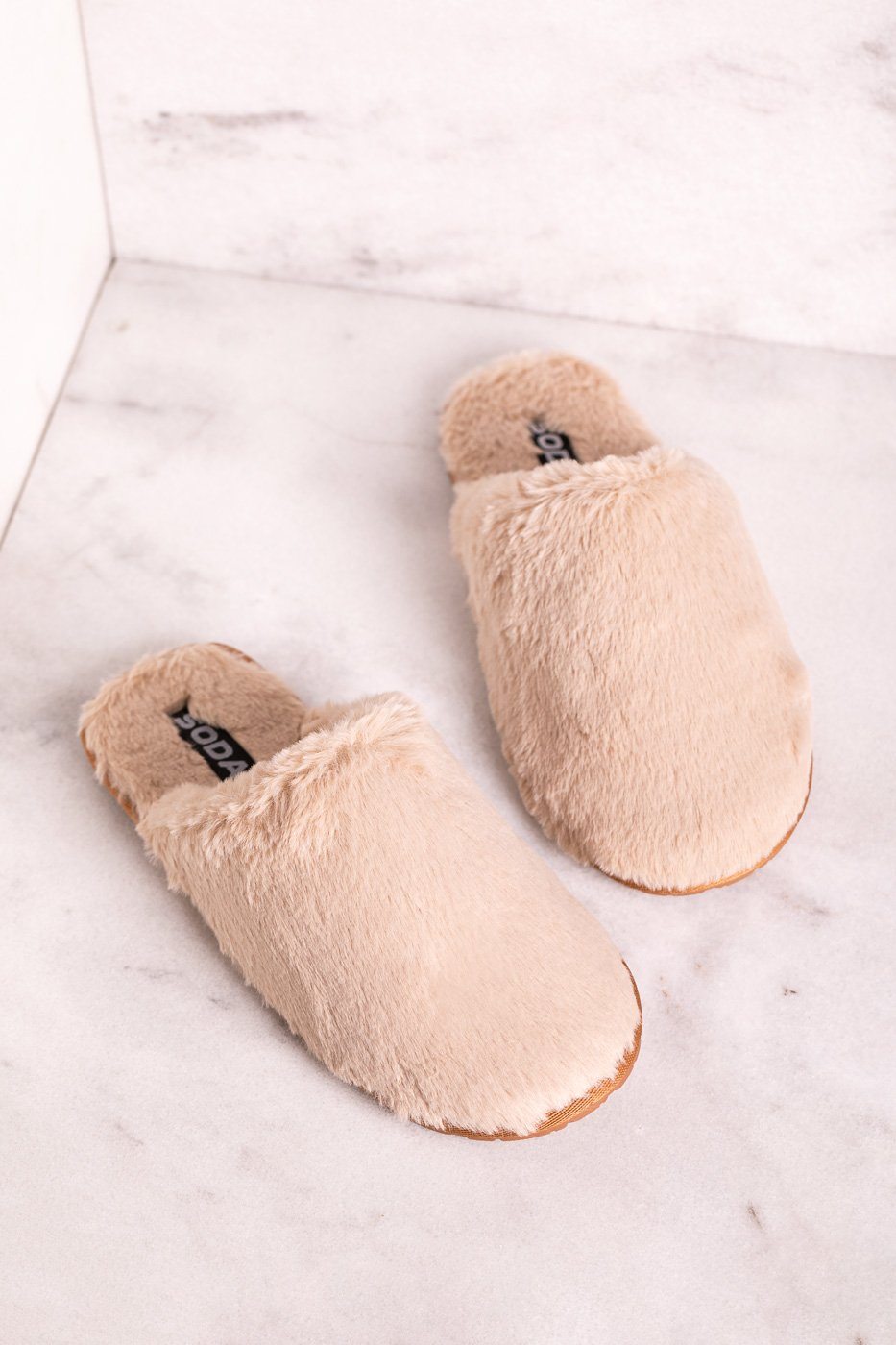 beige fluffy slippers