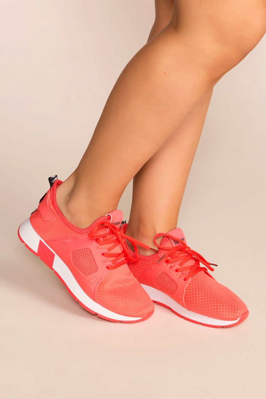 coral color sneakers