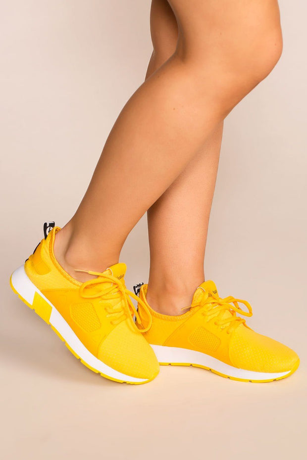 Running Circles Yellow Sneakers by 