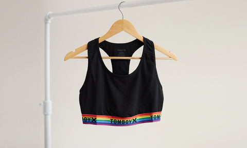 black and rainbow lounge bra on hanger