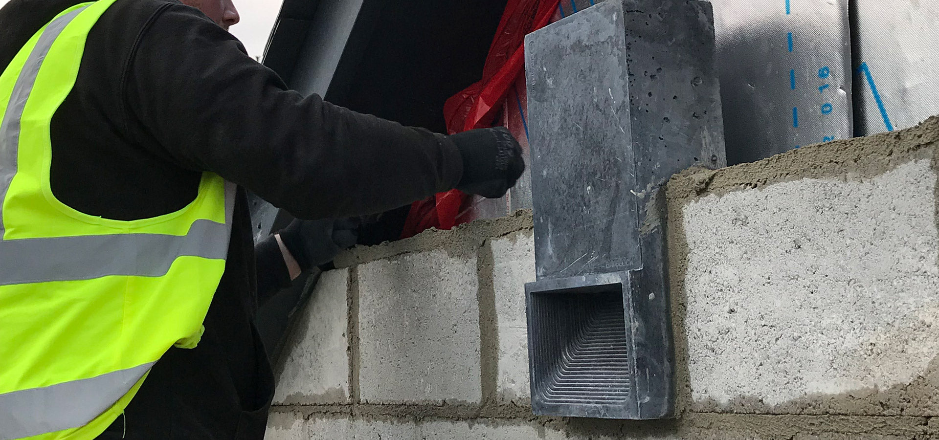 Bat block bat box being installed into block wall