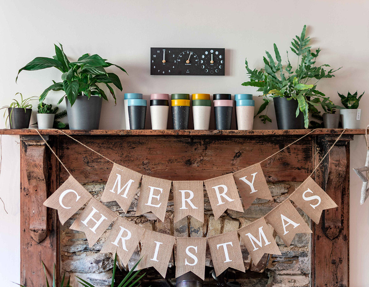 Circular and Co Christmas mantlepiece with cups and christmas banner