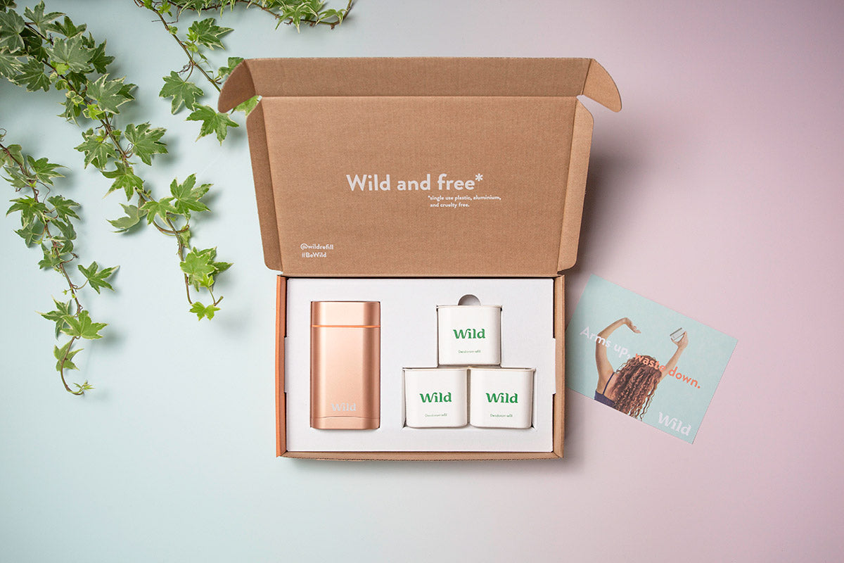 Wild circular selfcare products shown in a presentation gift box