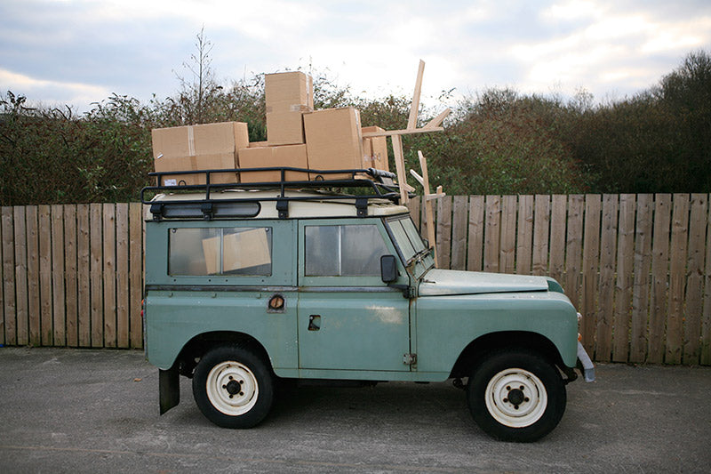 Green&BLue landrover laden with last orders for Christmas