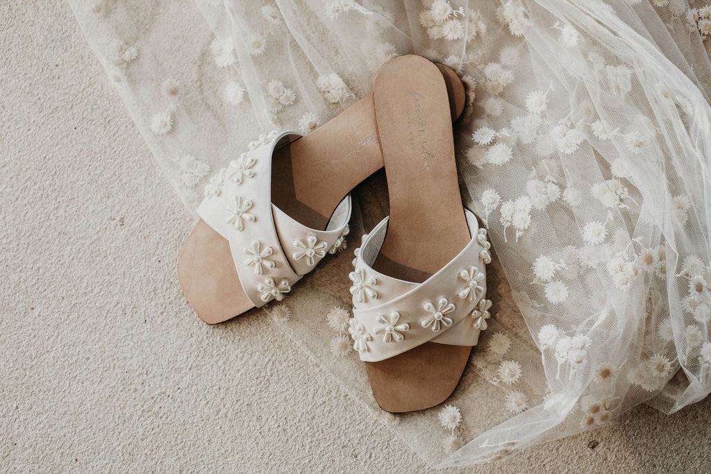 Our Melody Slides with pearl is absolutely gorgeous, comfortable and a great alternative to beach bridal sandals!