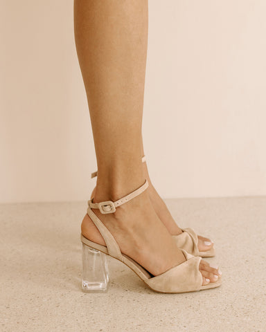 Nude shoes with clear heels