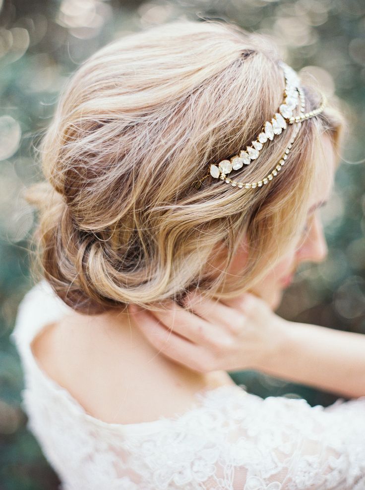 Romantic rolled updo perfect for the whimsical bridal style