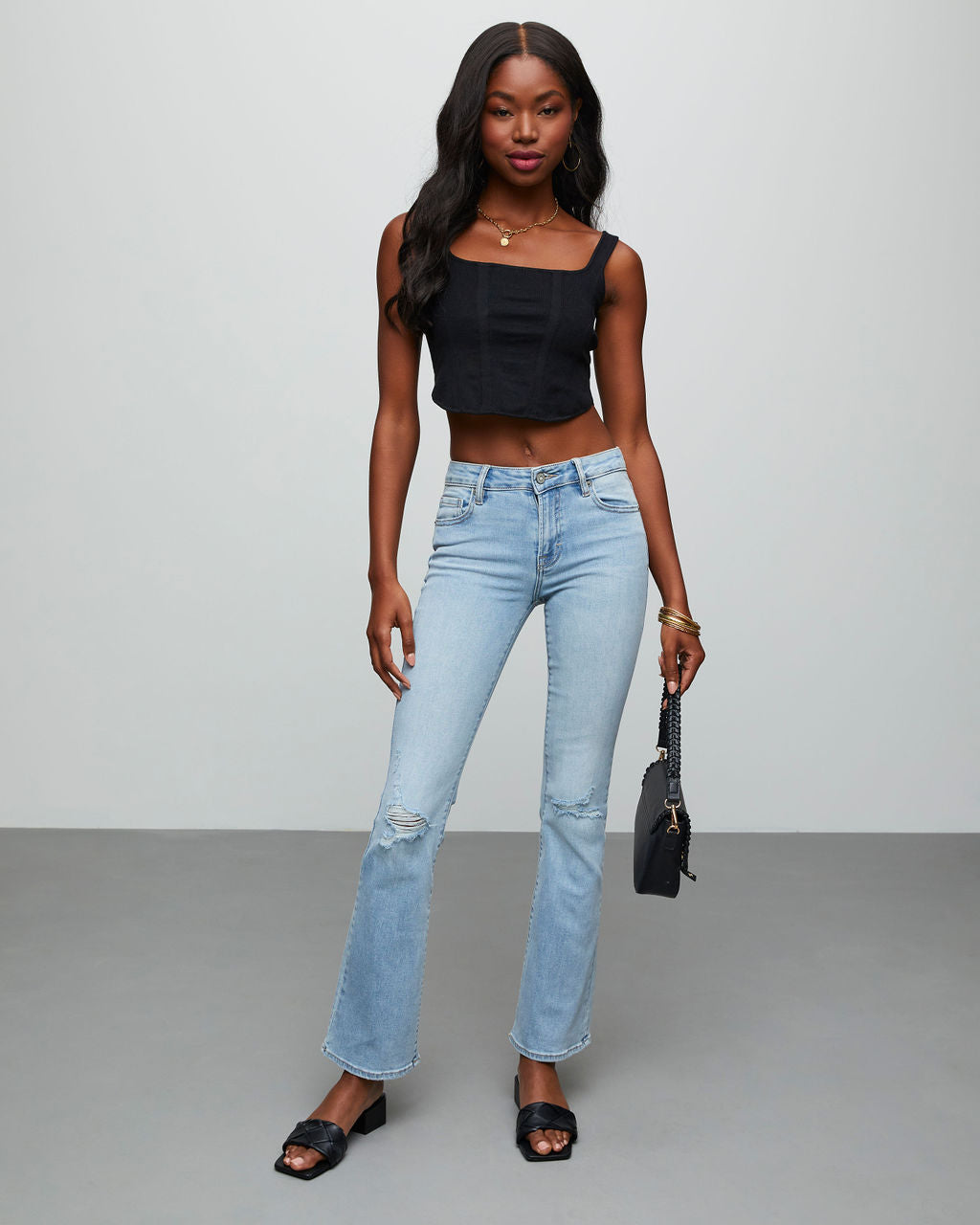 

Matira High Rise Distressed Flare Jeans