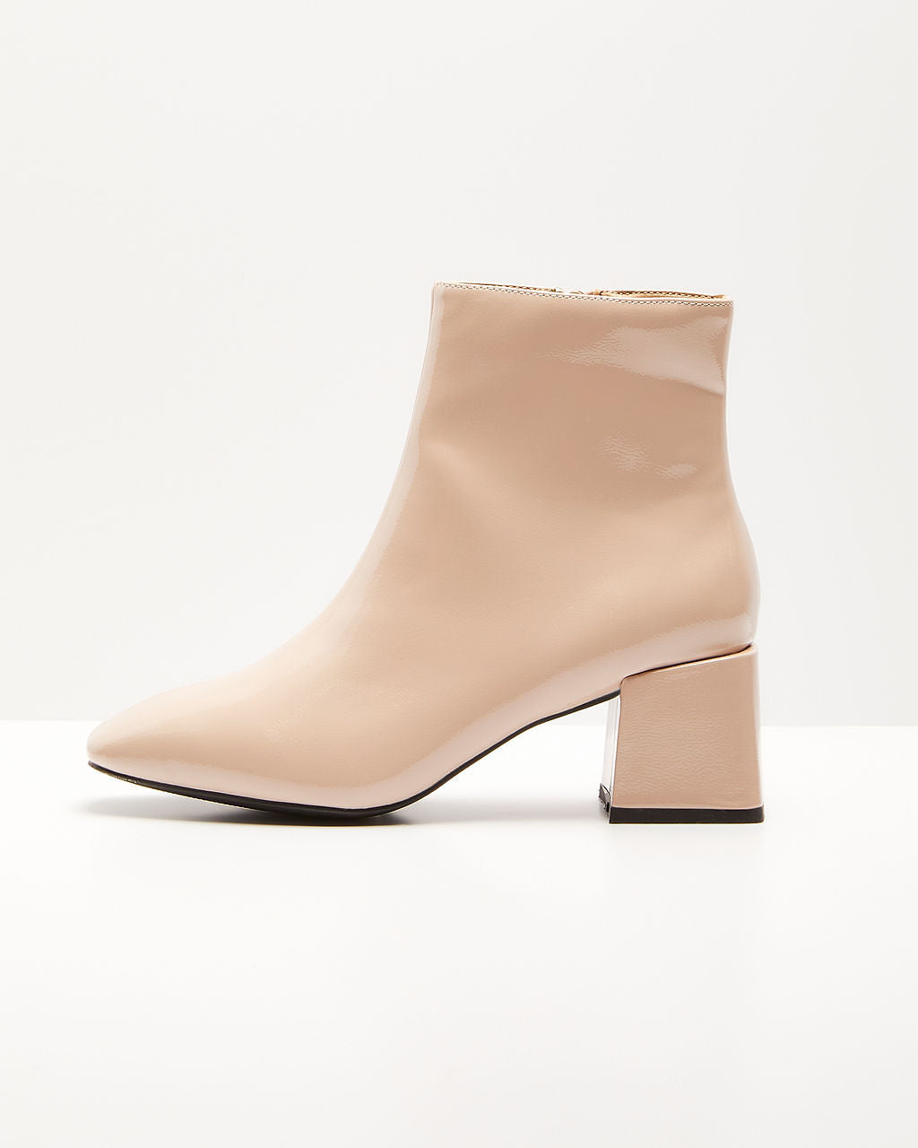 

Kelce Patent Faux Leather Ankle Booties