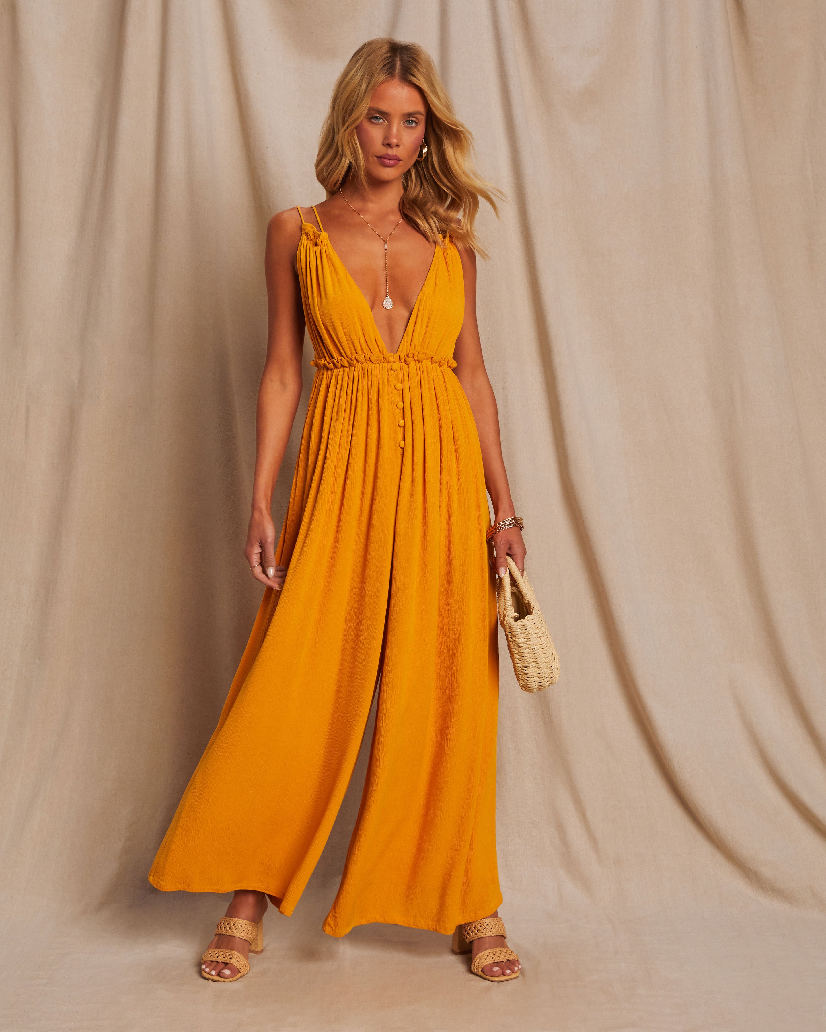 

Punta Cana V-Neck Button Wide Leg Jumpsuit