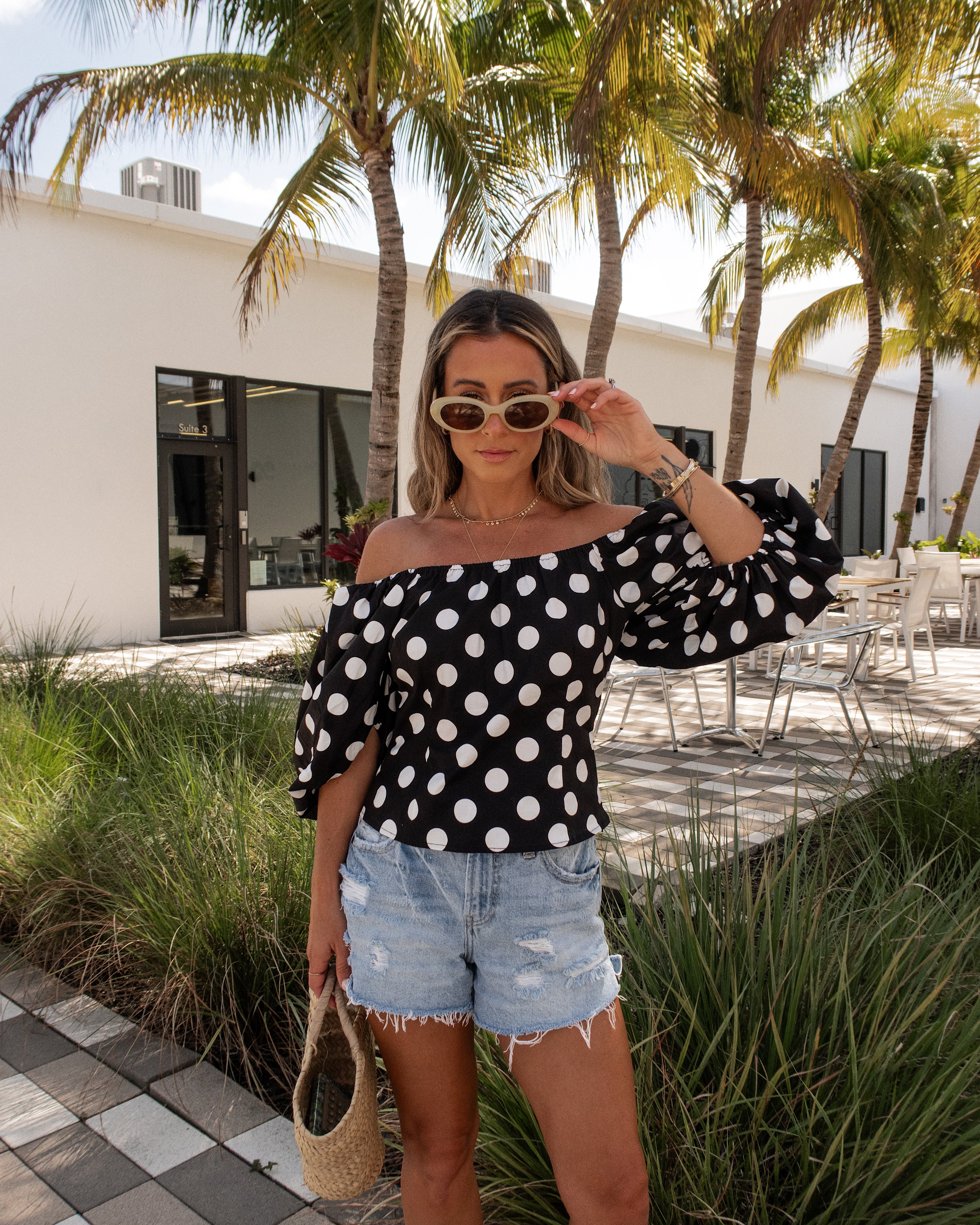 

Betty Off The Shoulder Polka Dot Blouse