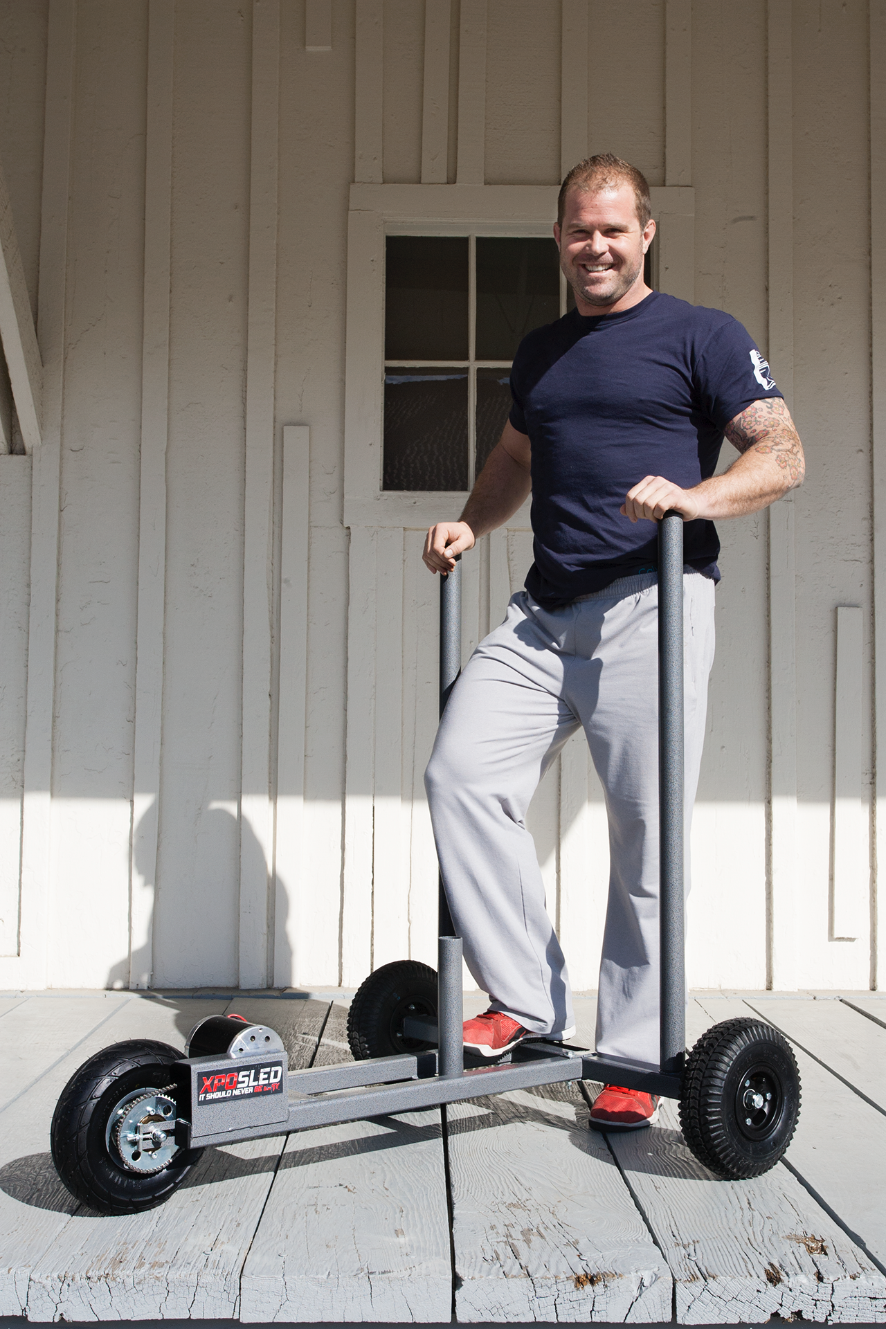 Dr. Kelly Starrett poses with the first production XPO Sled