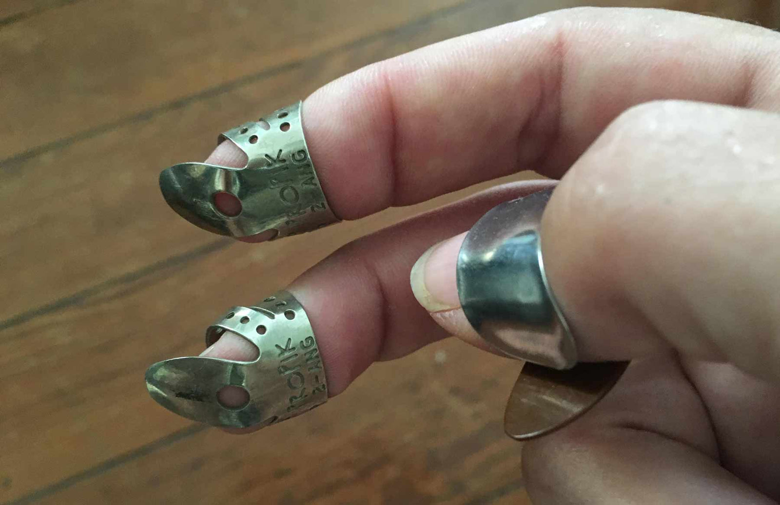 wearing finger picks