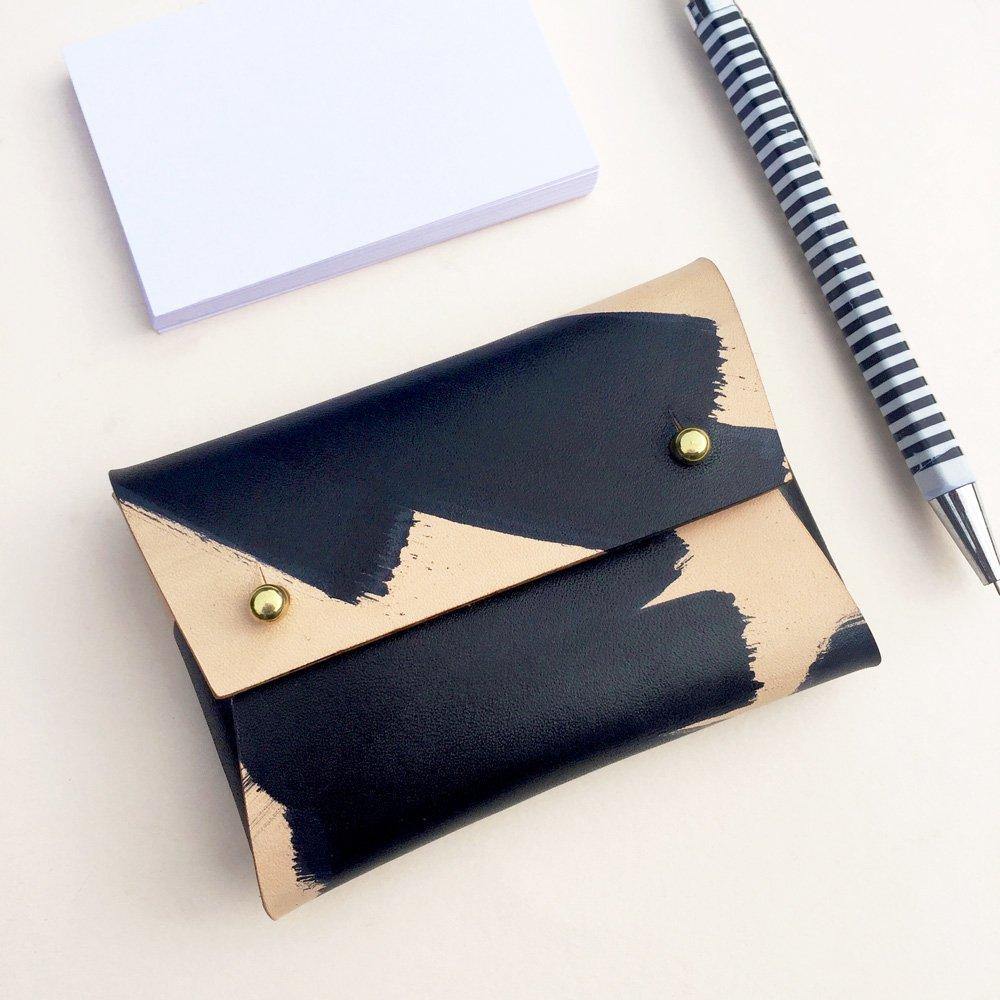 MILA Ink Brushed leather card wallet with business cards and a pen