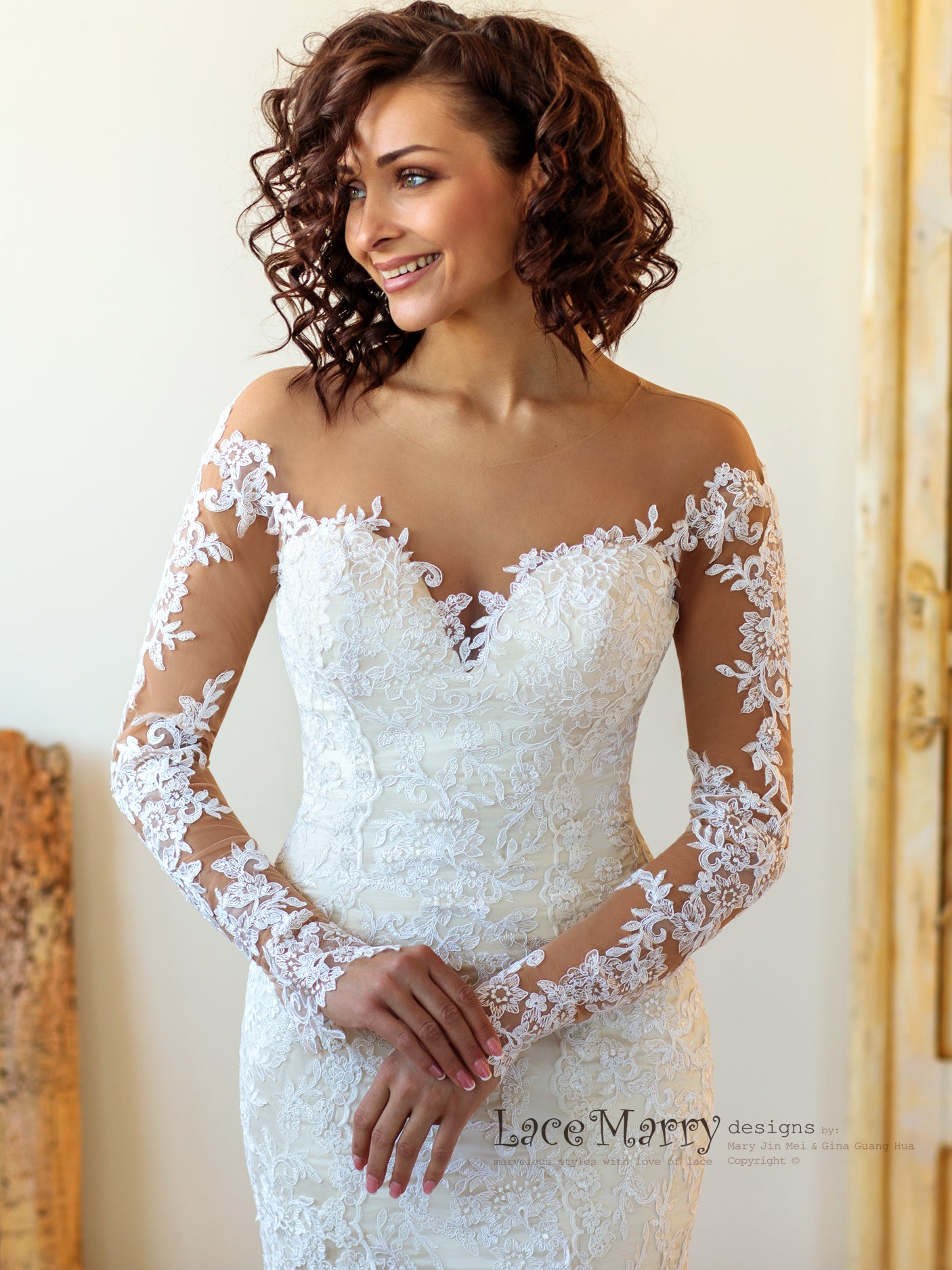 fitted lace long sleeve wedding dress