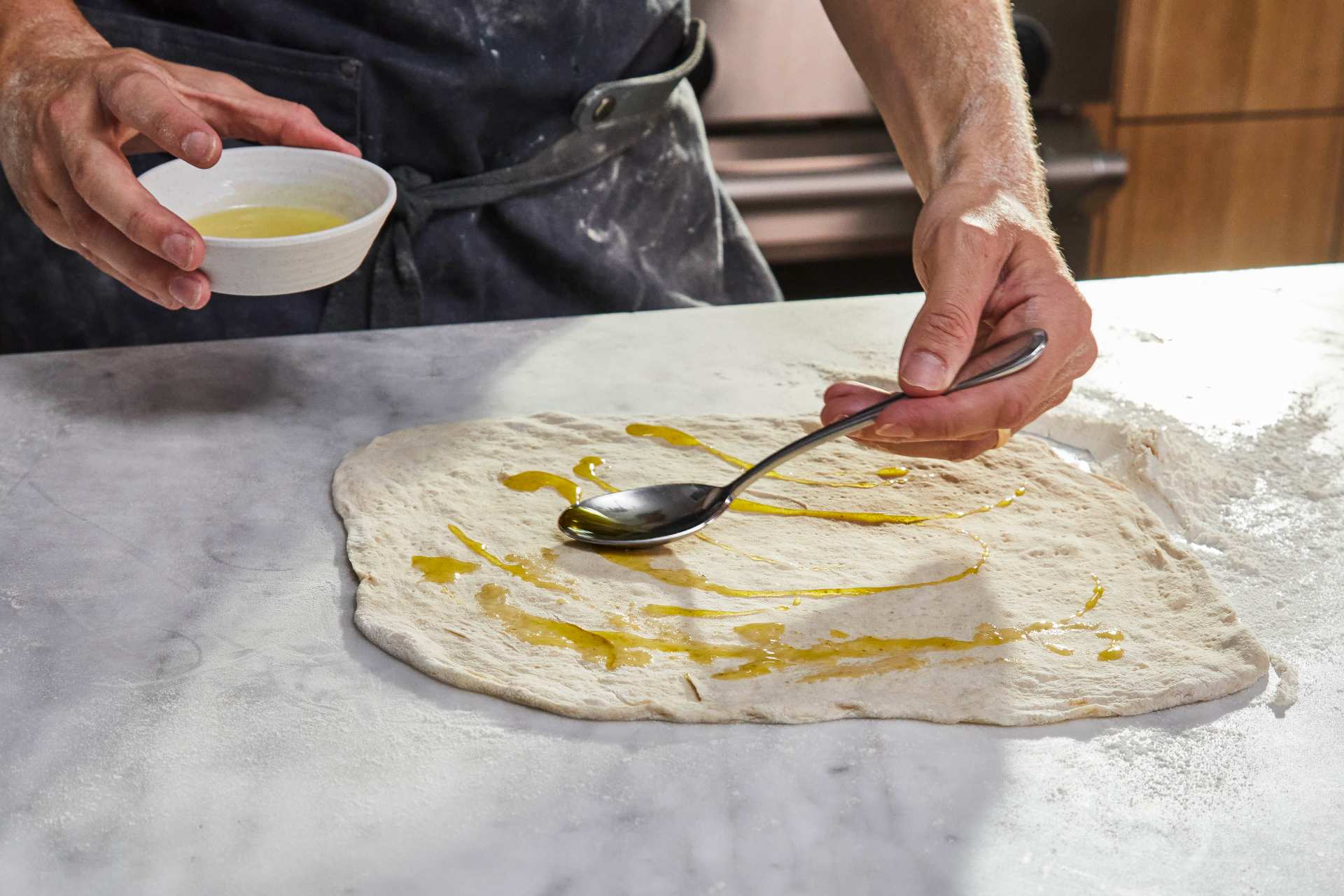 Pizza Crostini with Ricotta and Marinated Broccolini