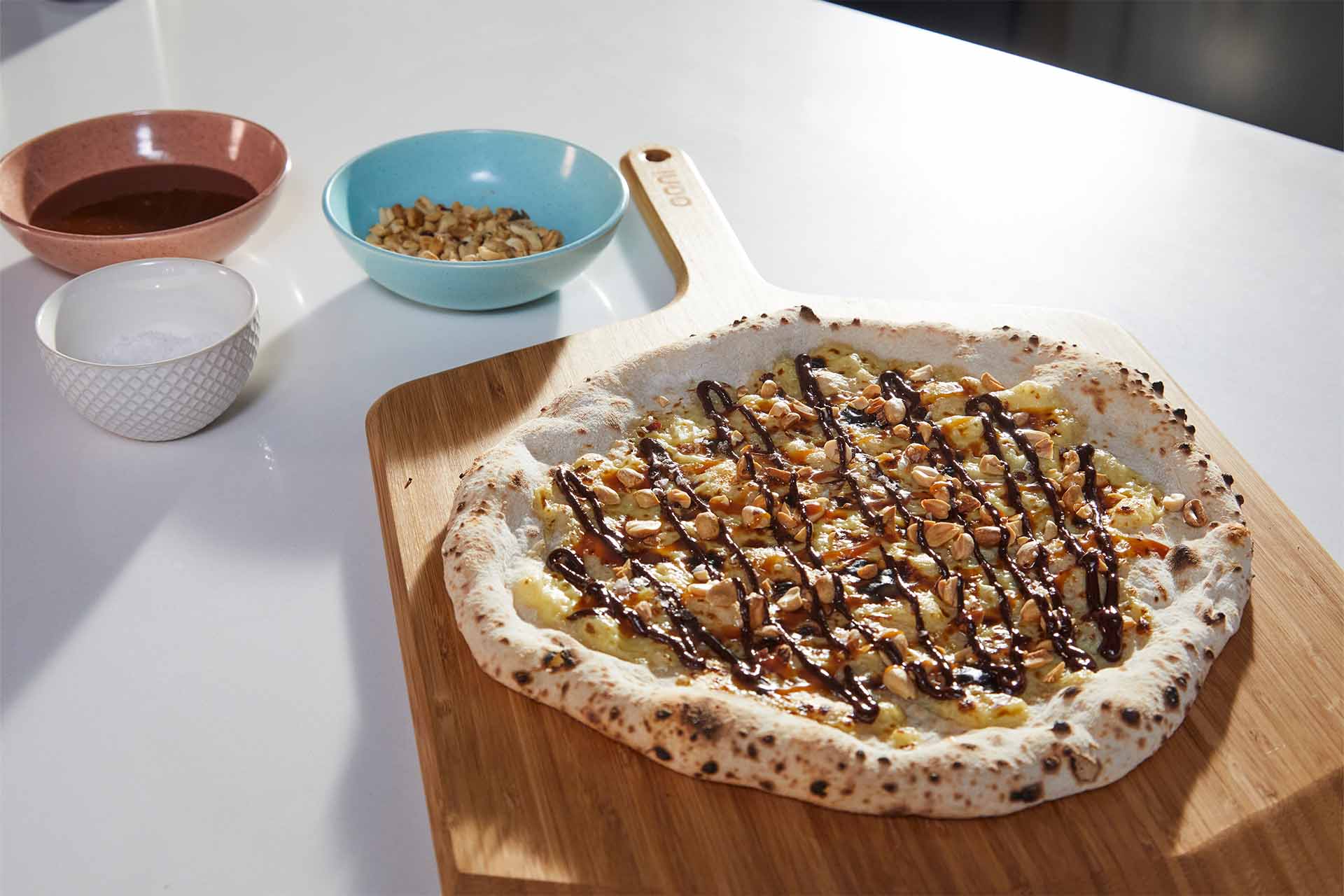 Chocolate, Caramel and Peanut Candy Bar Pizza