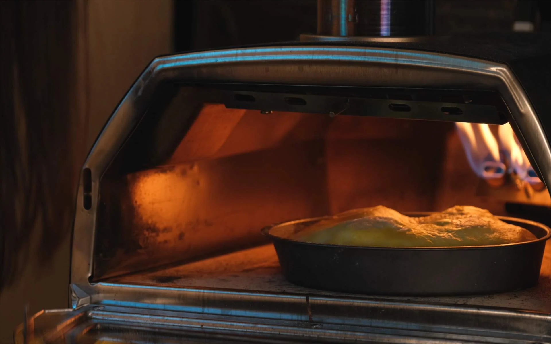 Torta pasqualina being cooked in an Ooni Karu 16 pizza oven