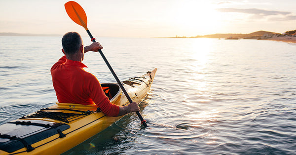 kayak on the sunset sea