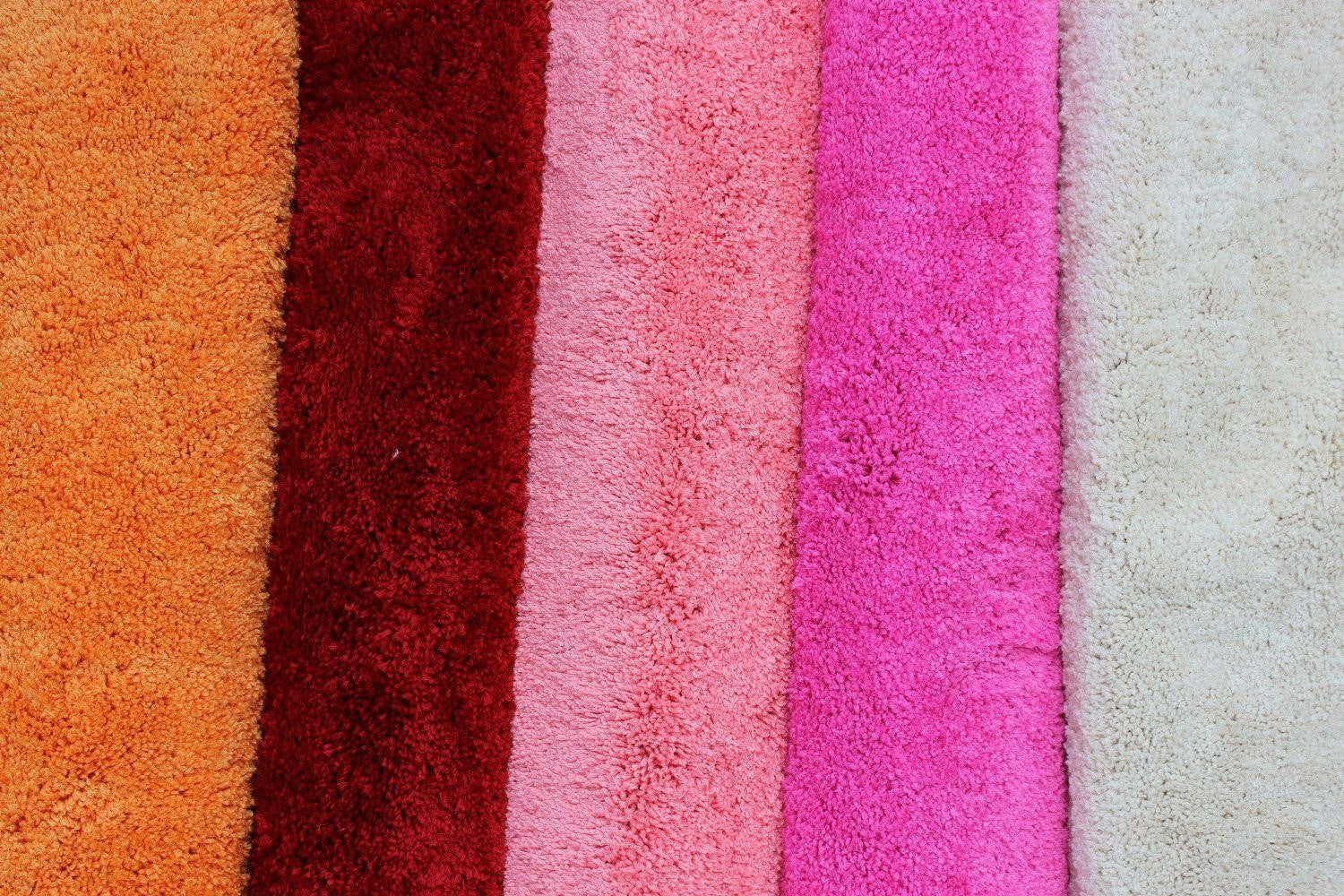 https://cdn.shopify.com/s/files/1/0206/7352/products/rugs-tache-solid-salmon-coral-pink-thin-rug-2.jpg?v=1579878505&width=1500