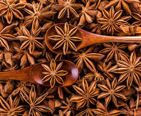Star Anise and wooden spoons