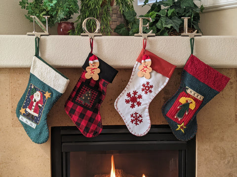 Christmas stockings hanging from mantle