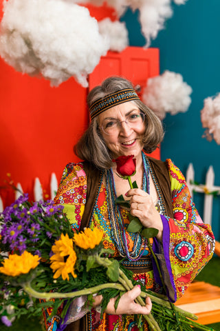 Older woman holding flowers