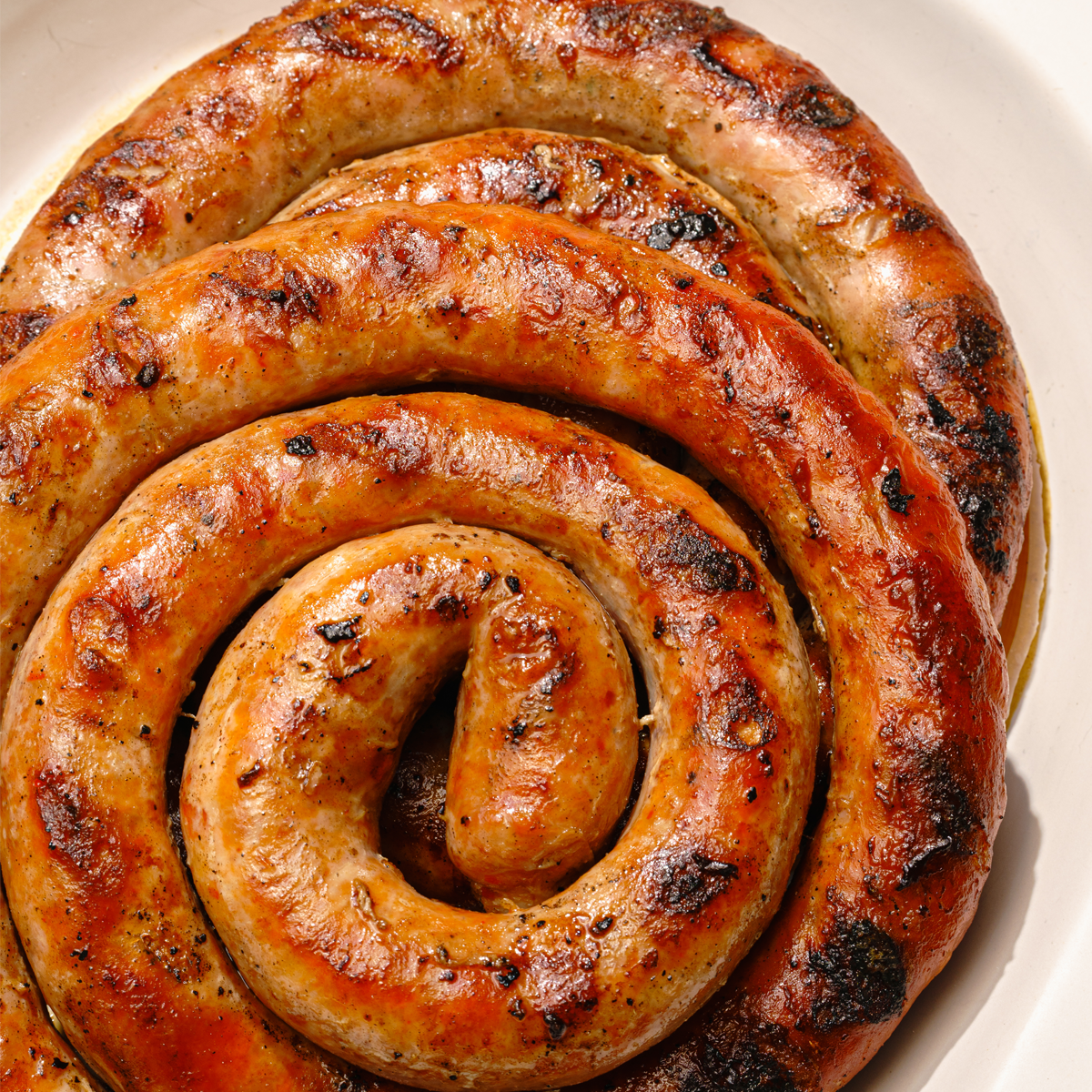 Sausage coils with pan-fried potatoes - Recipes 