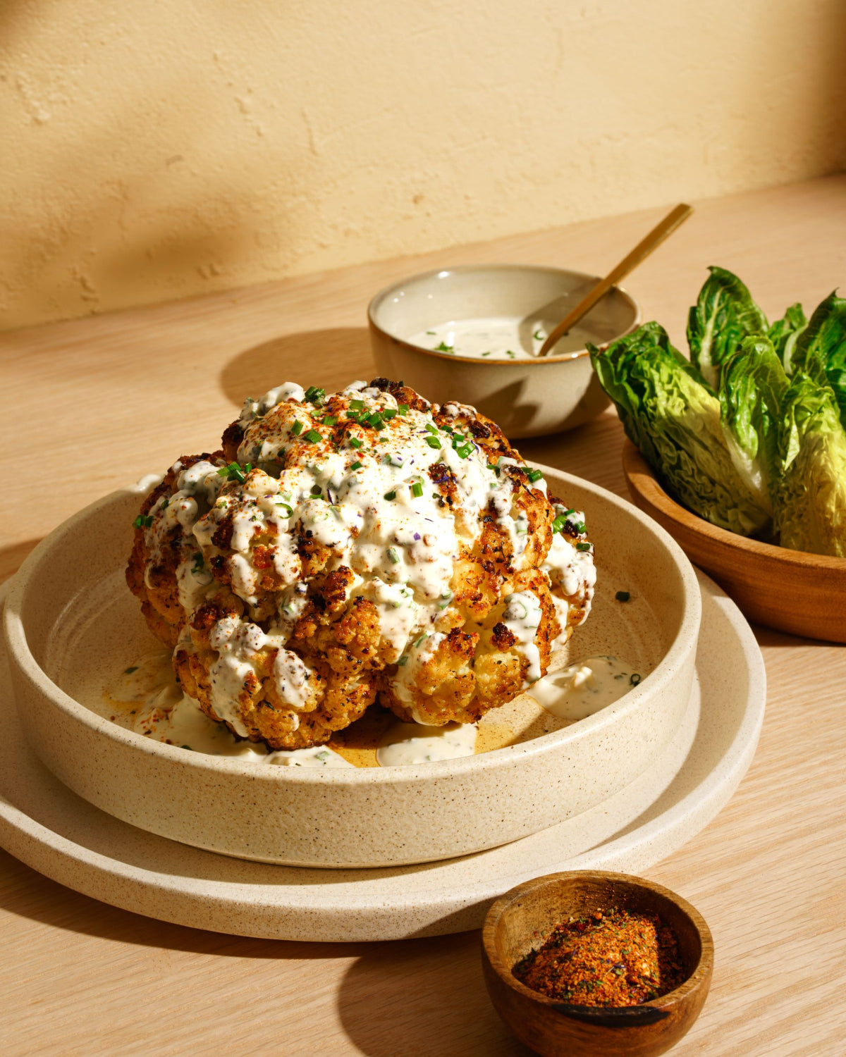 Bhutan Blossoms Whole Roasted Cauliflower with Blue Cheese and Buttermilk Dressing