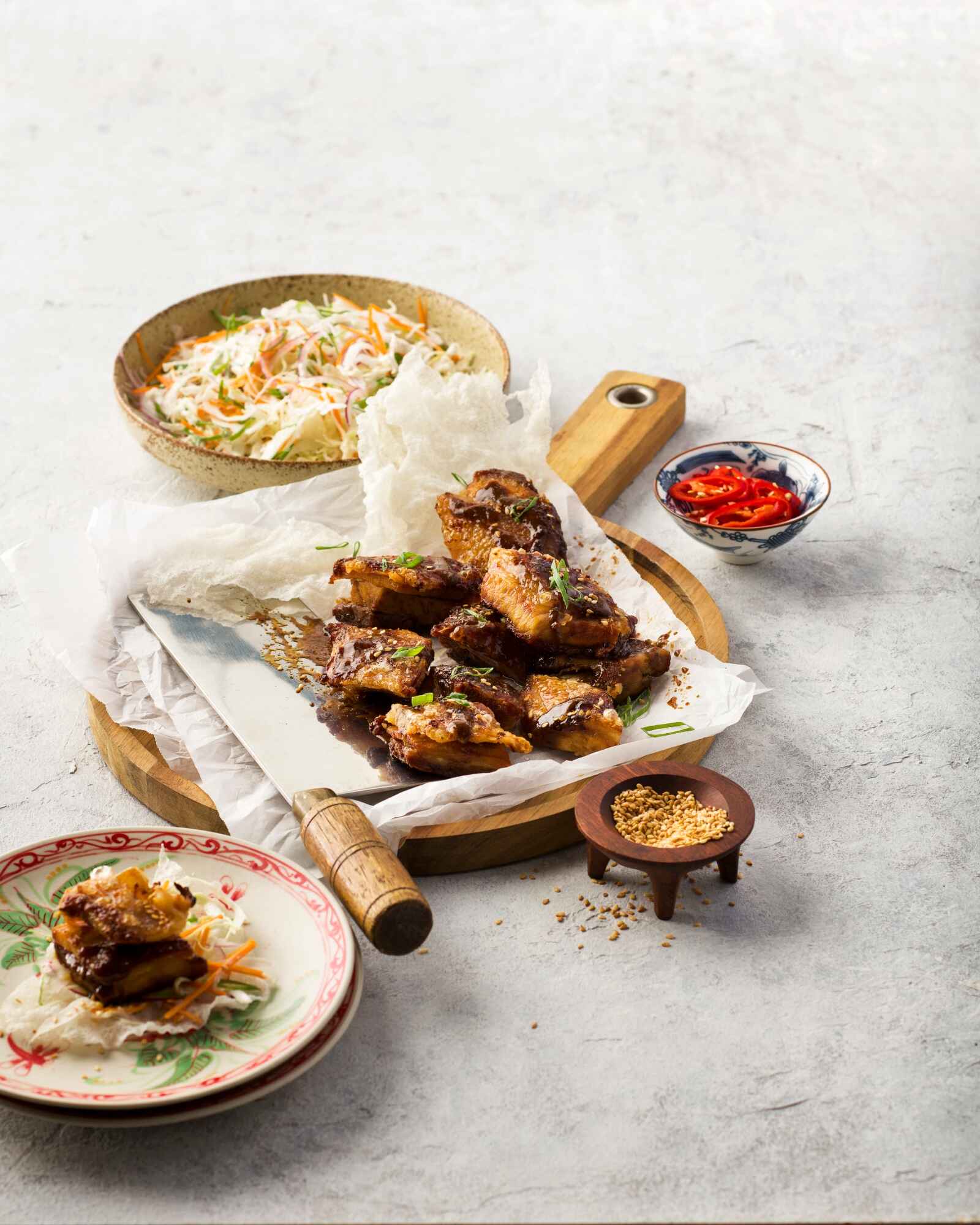 Slow Roasted Belly Pieces with Shaved Cabbage and Sesame and Lime Dressing