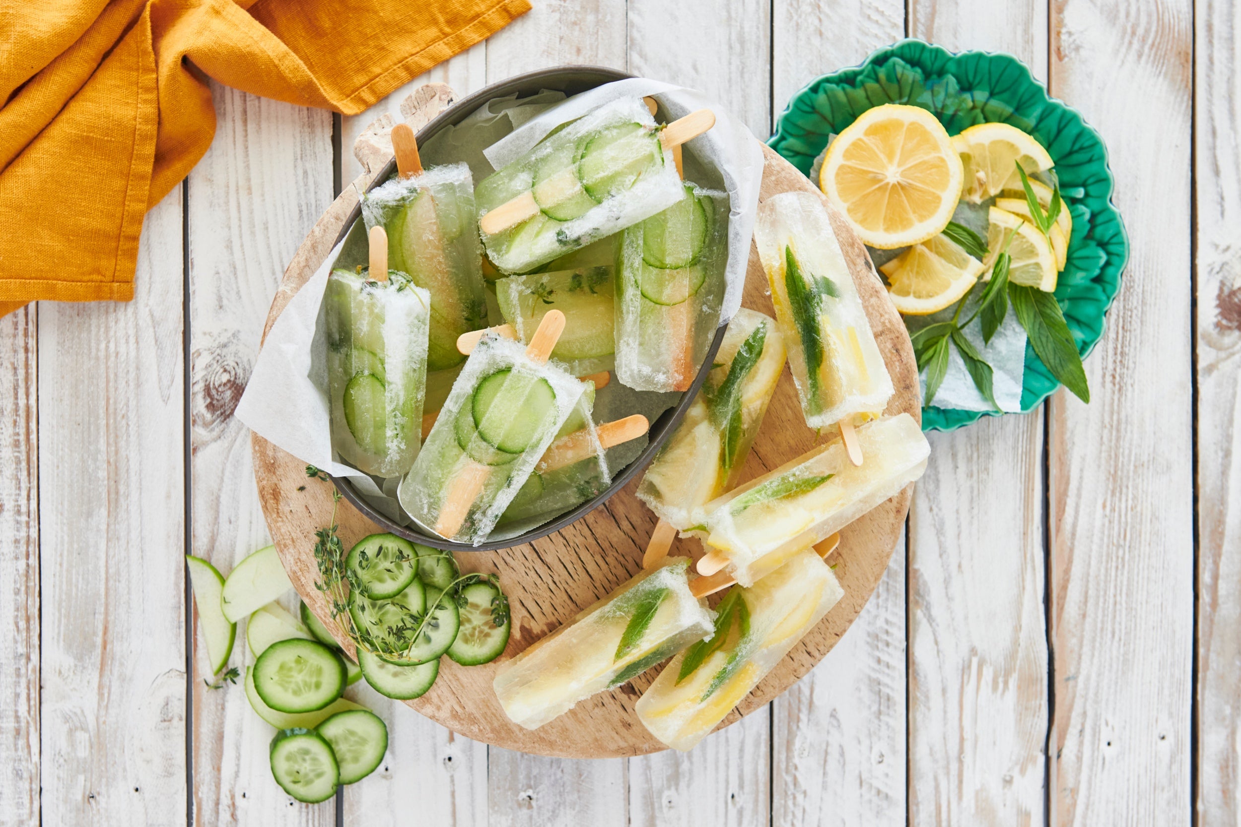 Boozy popsicle made with gin, tonic, fruit and herbs