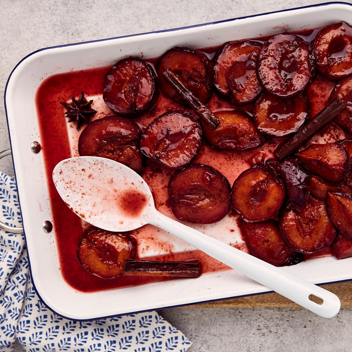 A dish of baked amber jewel plums