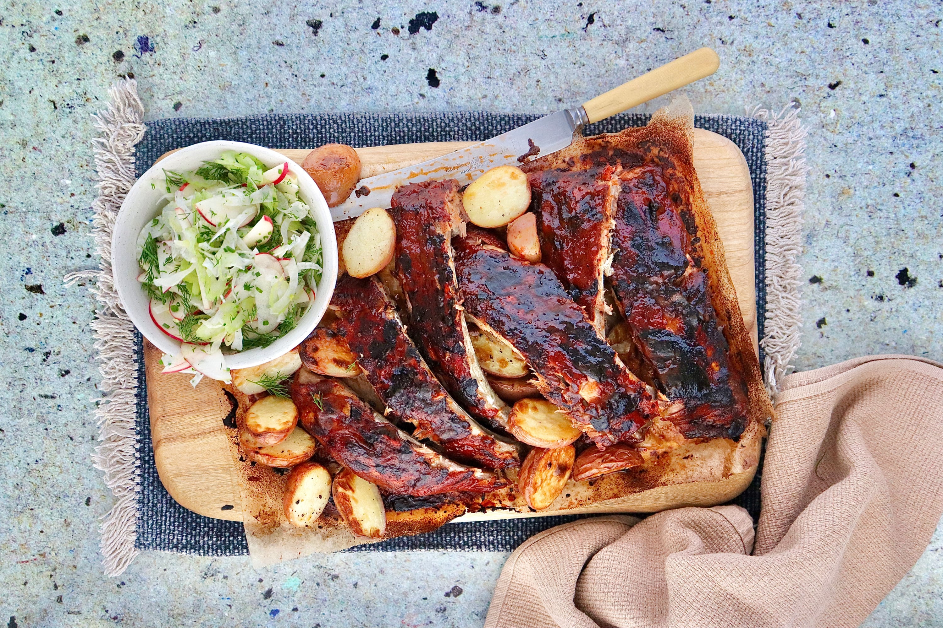 American Style Pork Ribs with fennel and celery salad and roasted potatoes