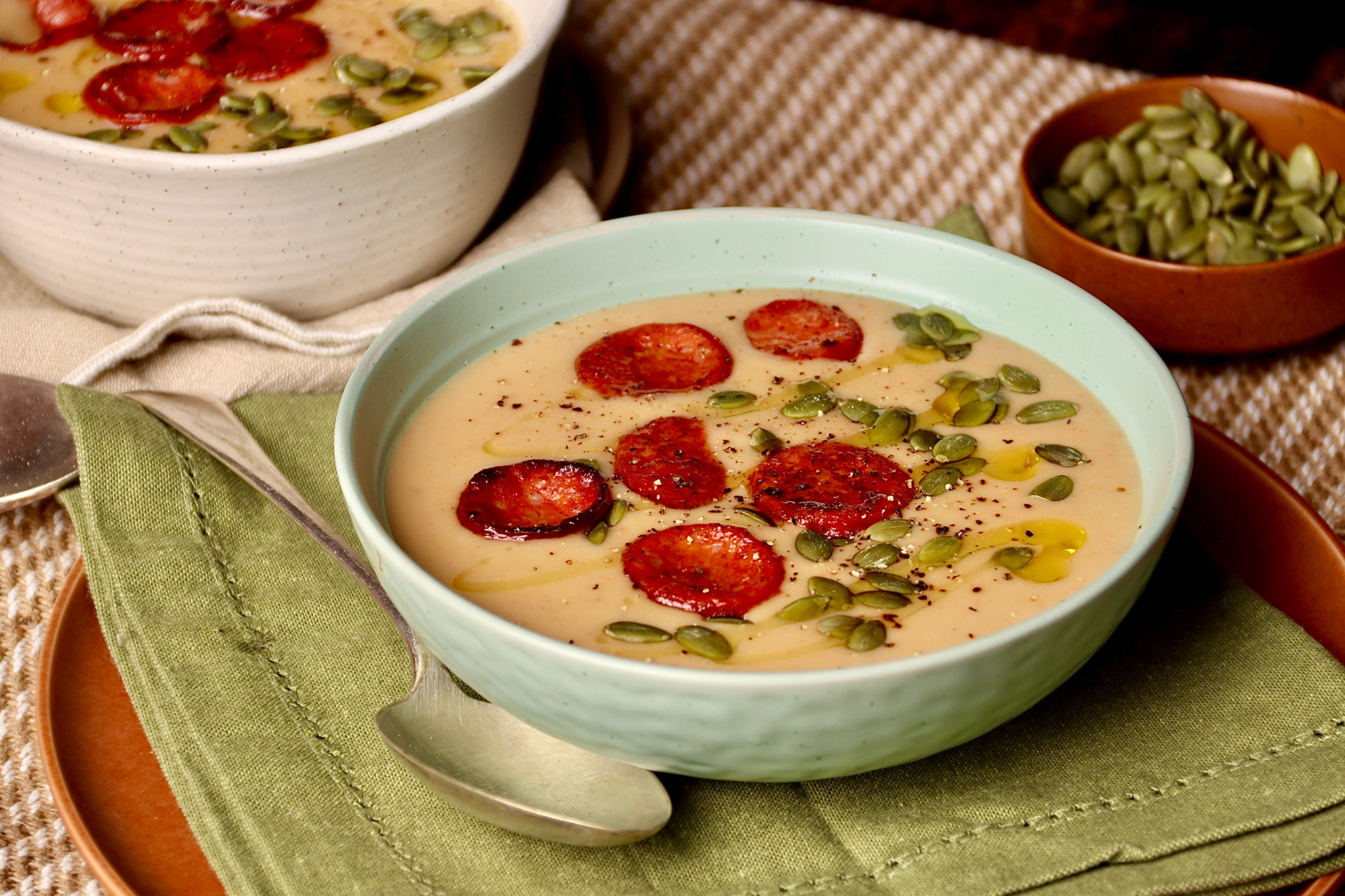 Potato, Leek, and Chorizo soup.  Topped with pepitas, olive oil and a splash of sherry vinegar.