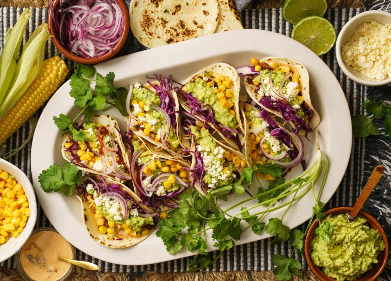 A platter of vegetarian rainbow tacos